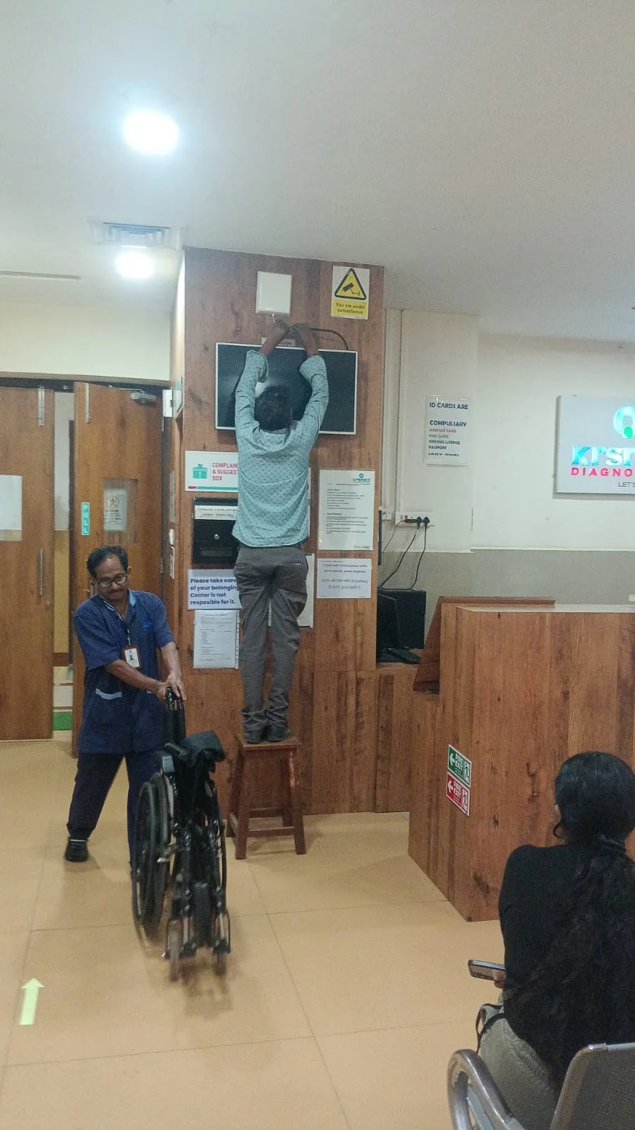 Technician completing indoor signal equipment installation